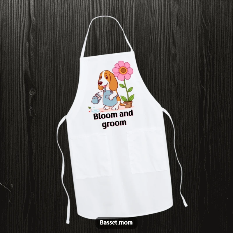 Funny Basset Hound apron showing a dog in a gardening apron watering a giant flower, perfect for gardening and outdoor fun.