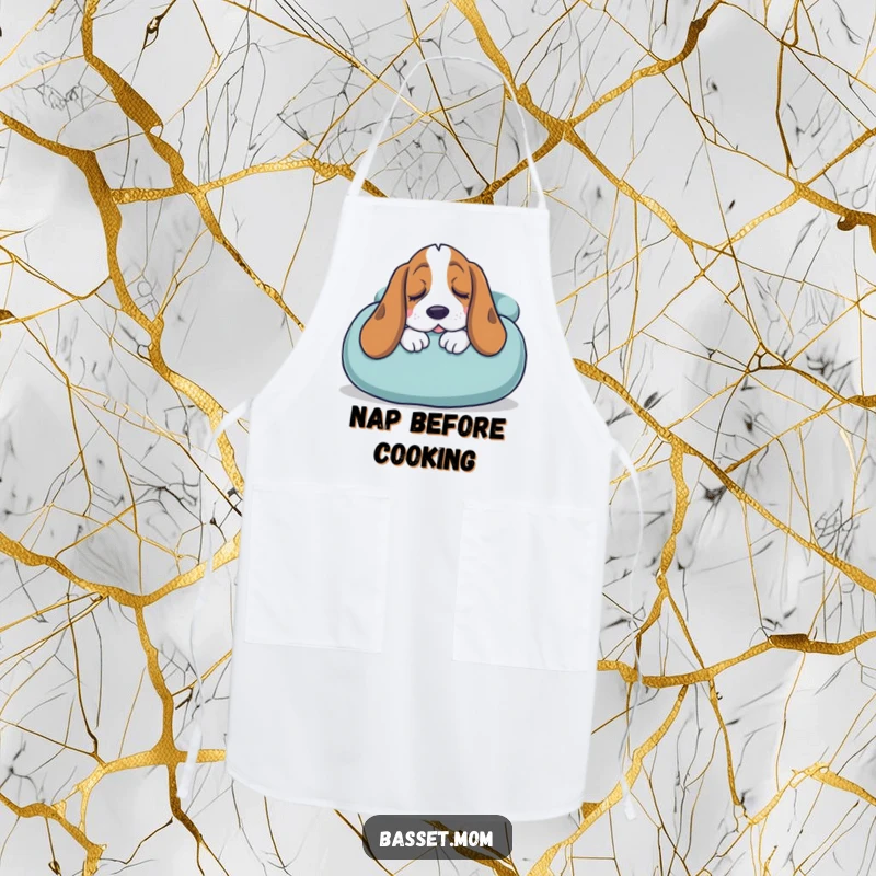 Funny Basset Hound apron featuring a sleepy dog snuggling into a giant cushion, a humorous and comfortable kitchen accessory.