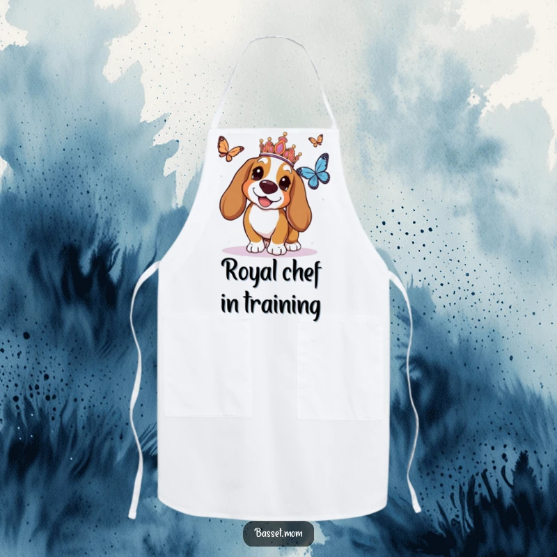 Funny Basset Hound apron featuring a tiara-wearing dog joyfully chasing a butterfly, adding whimsy to cooking and baking.