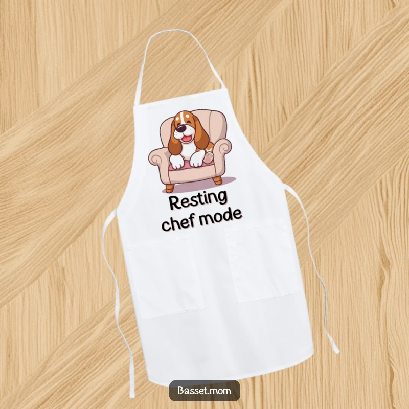 Funny Basset Hound apron, happy sigh while lounging on a cushioned chair, bringing peaceful humor to any cooking or baking session.