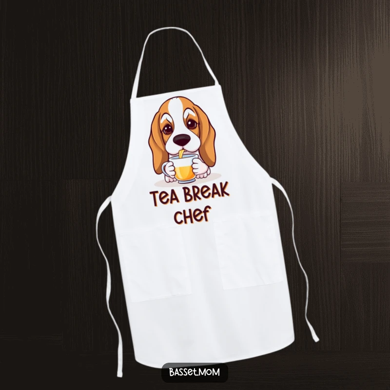 Funny Basset Hound apron showing a droopy-eared dog gracefully sipping tea, perfect for elegant cooking and tea parties.