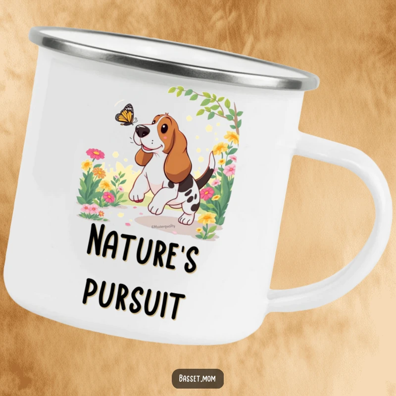 Funny Basset Hound Camping Mug: A dog chases a butterfly in a garden, perfect for outdoor drinks.