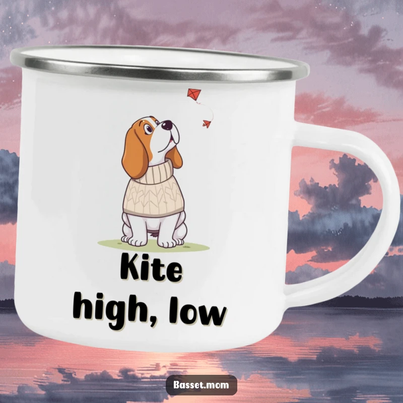 Funny Basset Hound camping mug showing a dog in a knitted sweater looking up at a kite, adding cozy humor to outdoor drinks.