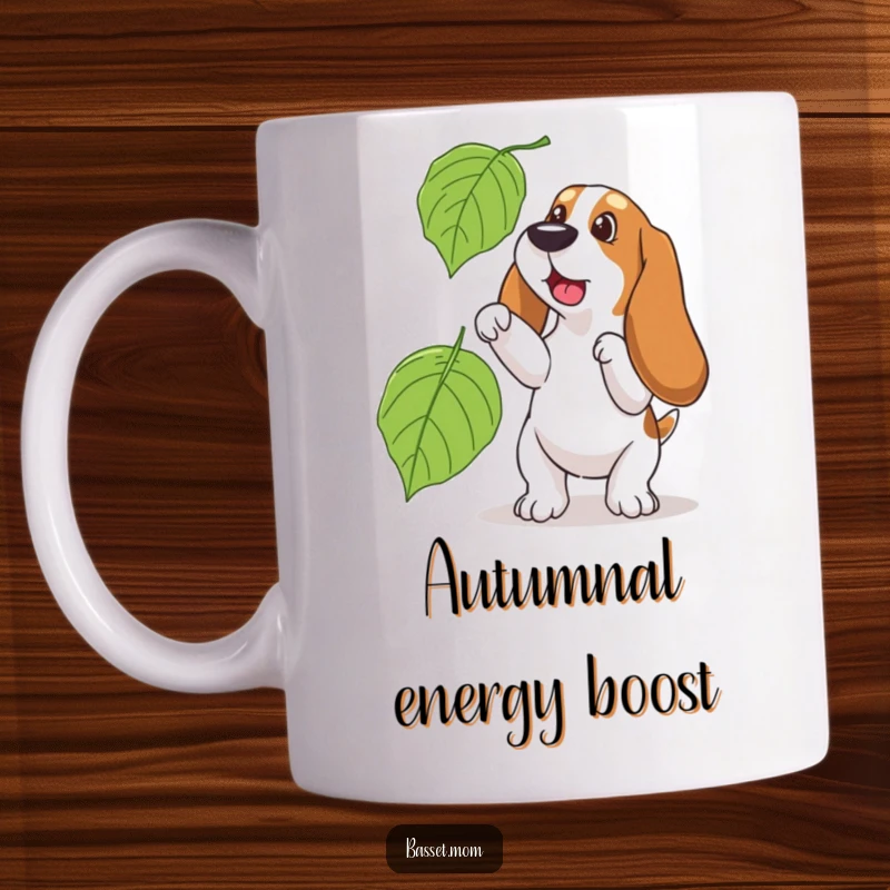 Funny Basset Hound mug, comically trying to catch a large falling leaf during autumn, showcasing playful dog antics.