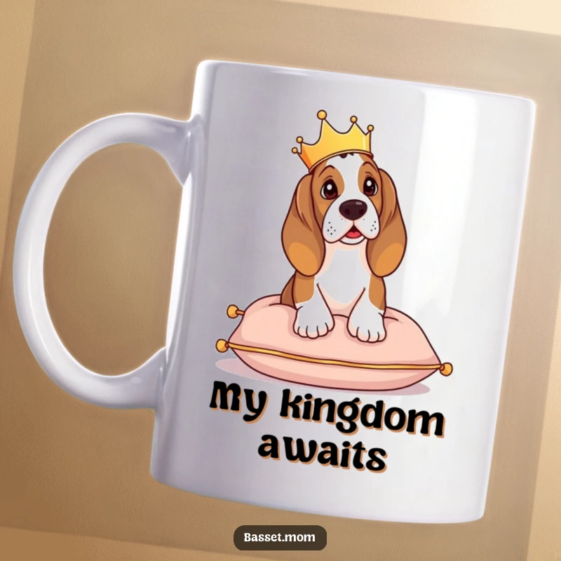 Funny Basset Hound mug, a dog wearing a small crown, sitting regally on a cushion, surveying its kingdom.