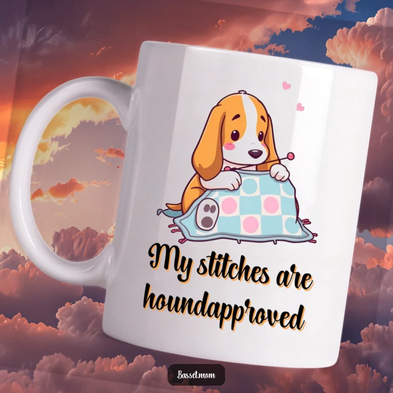 Funny Basset Hound quilting mug with a happy dog using a sewing needle to stitch a colorful quilt, perfect for crafters and dog lovers.
