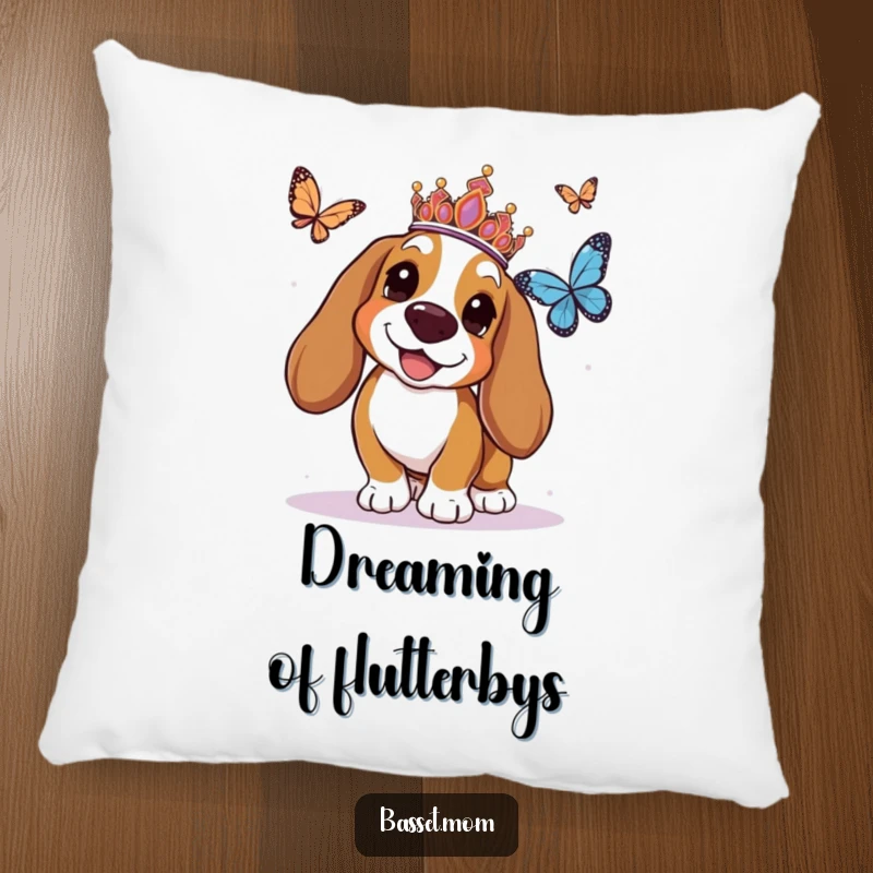 Funny Basset Hound pillow with a tiara-wearing dog joyfully chasing a butterfly, offering a soft, humorous, and regal decorative touch.