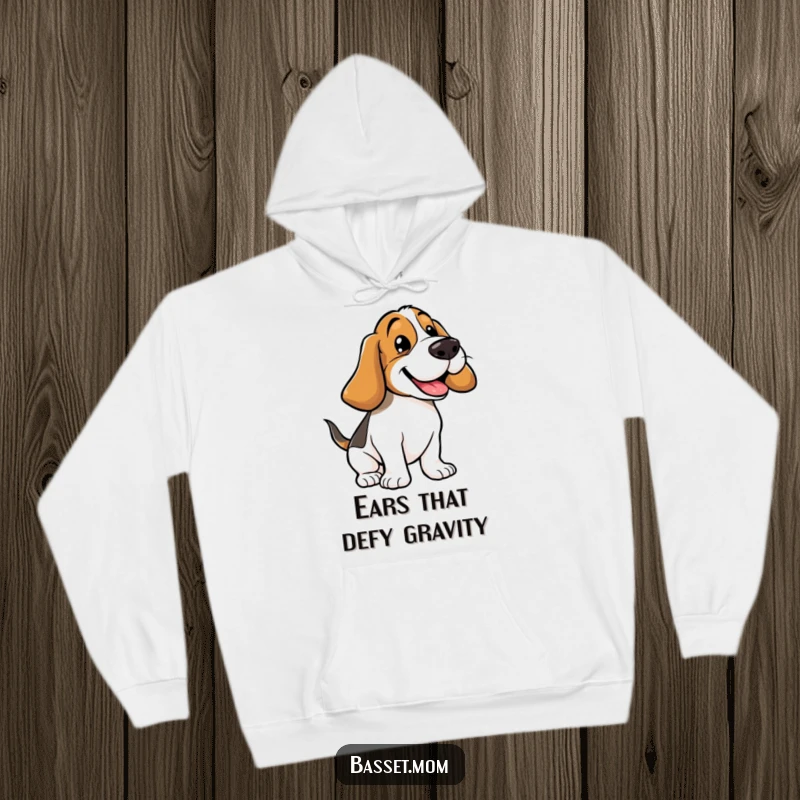 Funny Basset Hound hoodie featuring a happy dog with floppy ears bouncing, emphasizing its comical movement and lovable, energetic spirit.