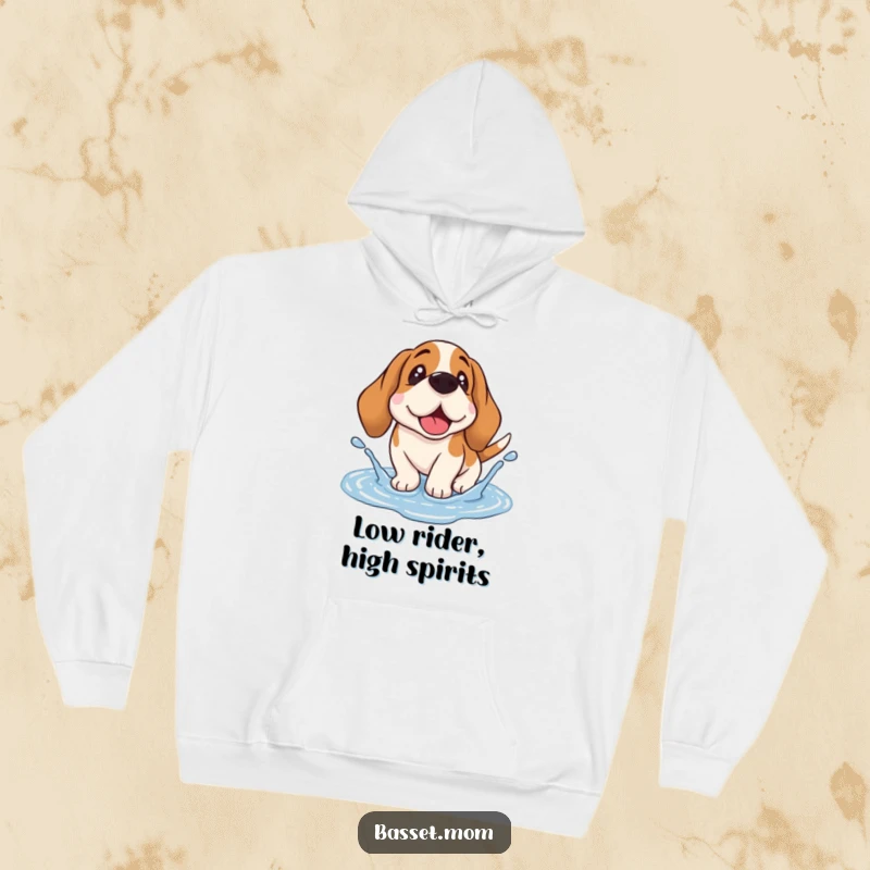 Funny Basset Hound hoodie featuring a droopy-eared dog happily splashing in a puddle, perfect for cozy, humorous moments.