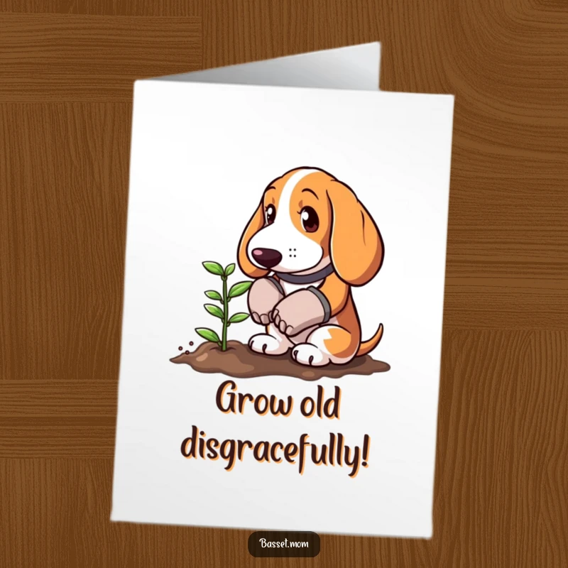 Funny Free Printable Birthday Card: Basset Hound in gardening gloves, happily planting a tiny green sprout in soil.
