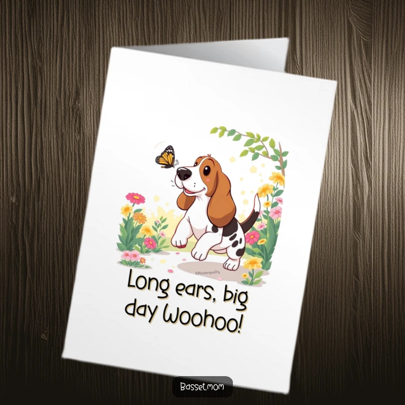 Funny Free Printable Birthday Card: Basset Hound joyfully chasing a butterfly in a sunny garden.
