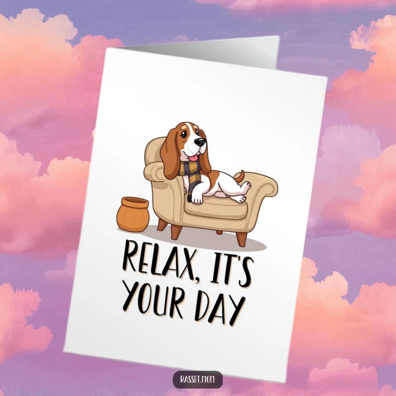 Funny Free Printable Birthday Card: A Basset Hound wearing a warm scarf lounges comfortably on a plush armchair.