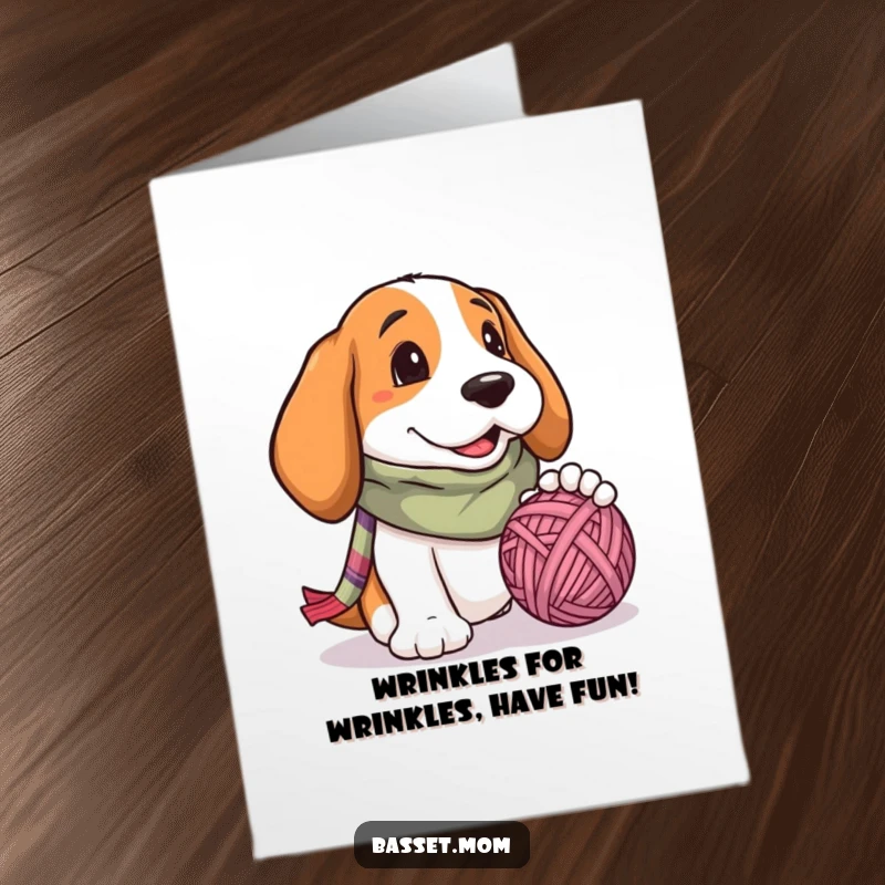 Funny Free Printable Birthday Card: Basset hound in scarf, joyfully playing with a yarn ball, perfect digital download.