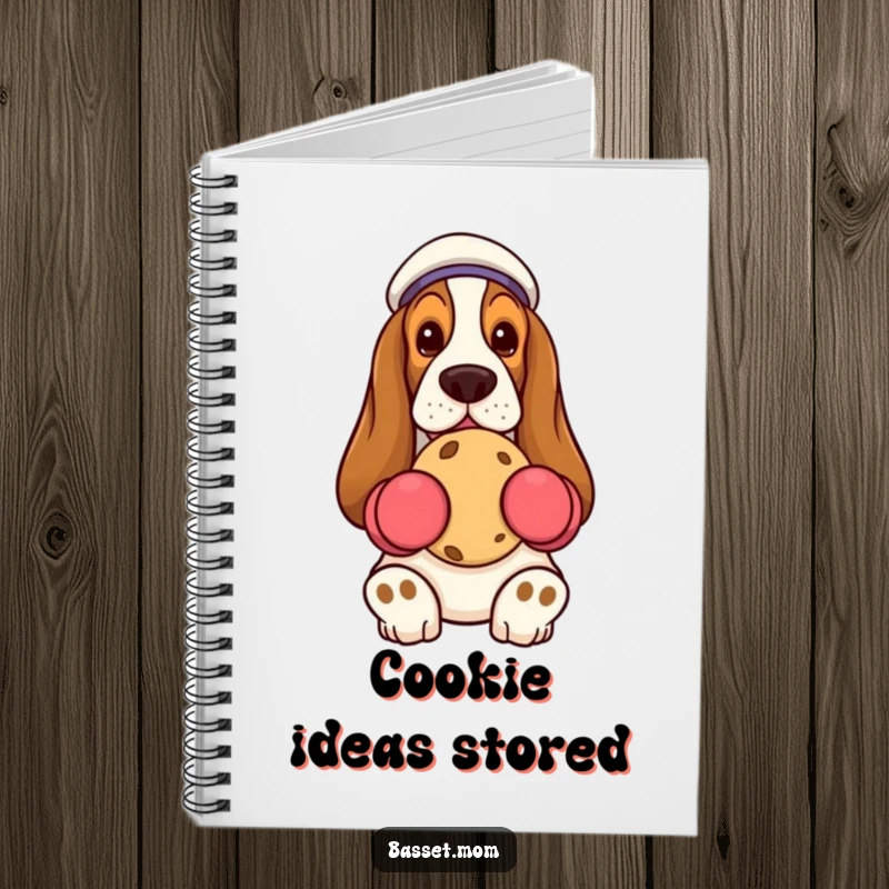 Funny Basset Hound holding cookie, oven mitts, lined notebook, humorous stationery gift.