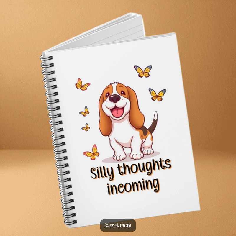 Funny Basset Hound notebook cover featuring a dog with a happy grin, chasing butterflies, inspiring creative thoughts and imaginative ideas.