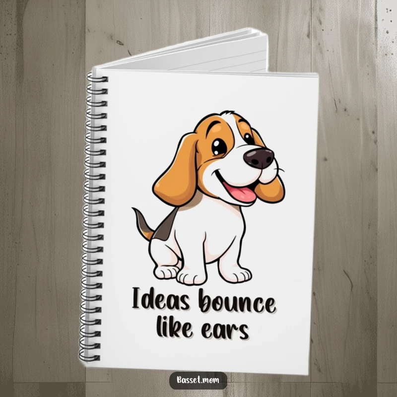 Funny Basset Hound notebook cover featuring a dog mid-bounce, floppy ears flying, conveying energetic and comical happiness for note-taking.