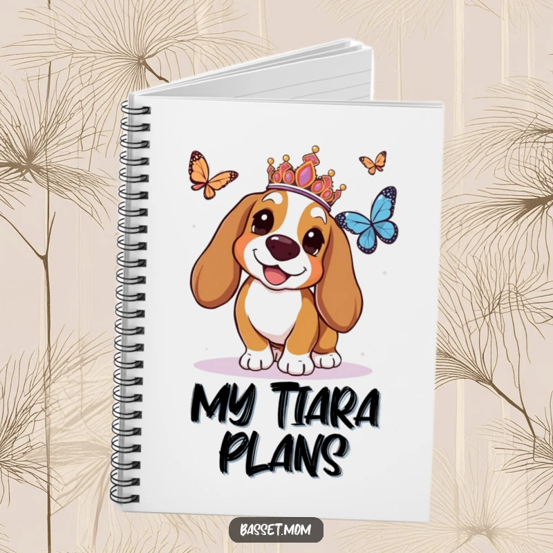 Funny Basset Hound notebook with a tiara-wearing dog joyfully chasing a butterfly, perfect for jotting down notes with regal humor.