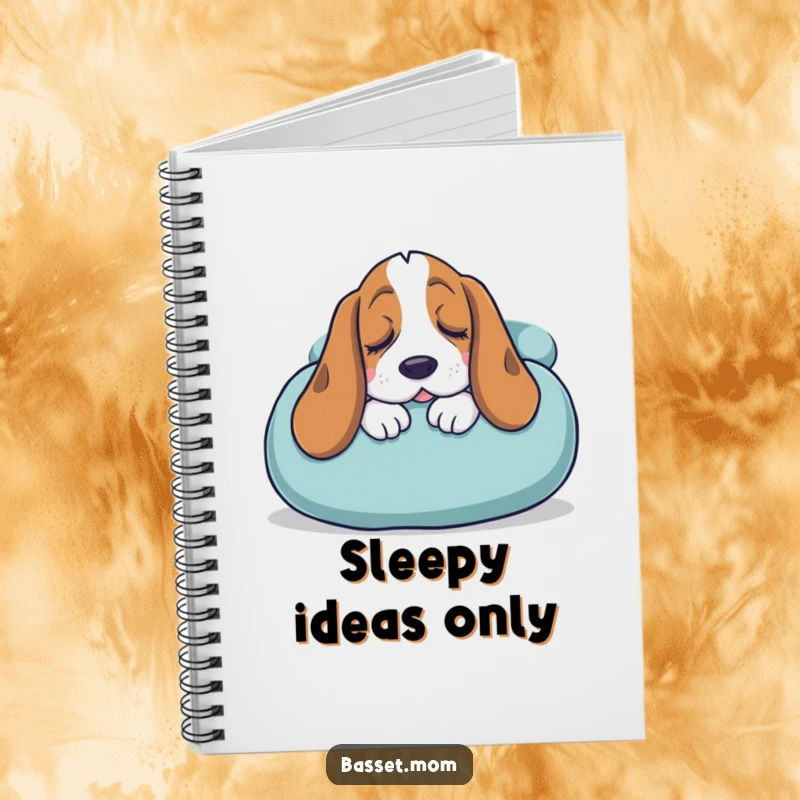 Funny Basset Hound notebook with a sleepy dog snuggling into a giant cushion, ideal for noting down peaceful thoughts.