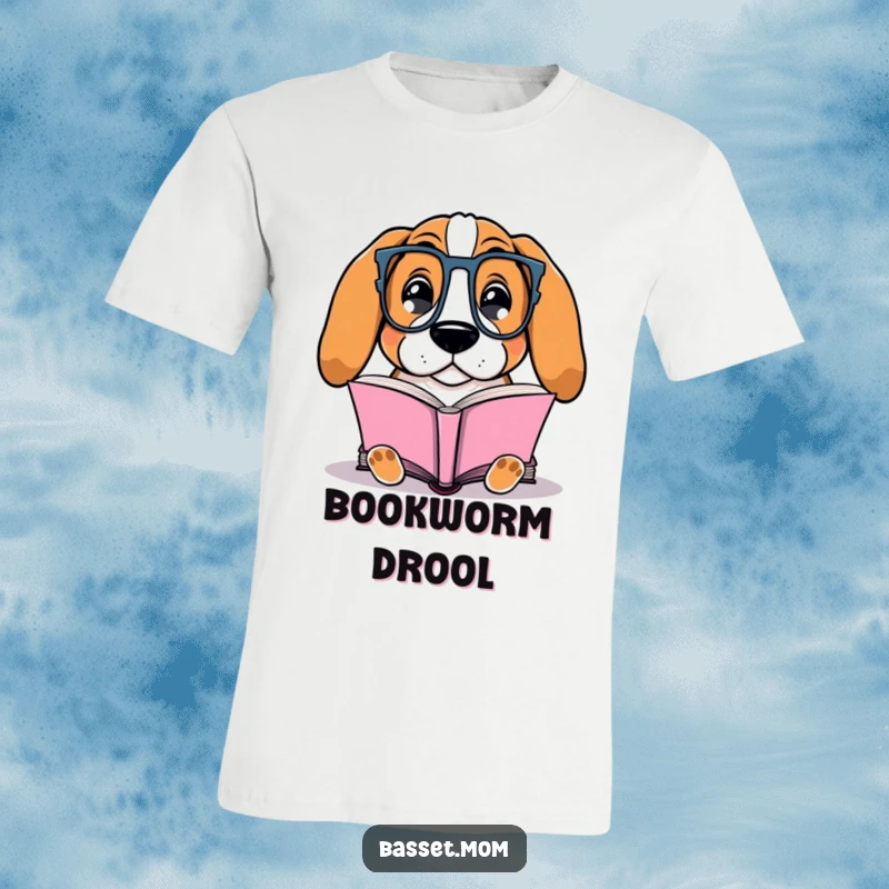 Funny Basset Hound t-shirt featuring a dog with glasses contentedly reading a book, portraying a charming, studious scene.