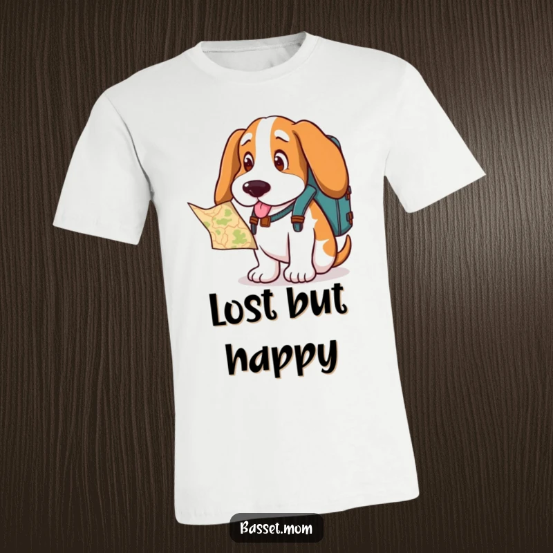 Funny Basset Hound t-shirt, a dog wearing a backpack, looking curiously at a map, embodying a sense of exploration.