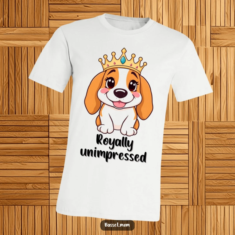 Funny Basset Hound wearing a crown poses regally with a smile, printed on a t-shirt, a humorous depiction of canine nobility.