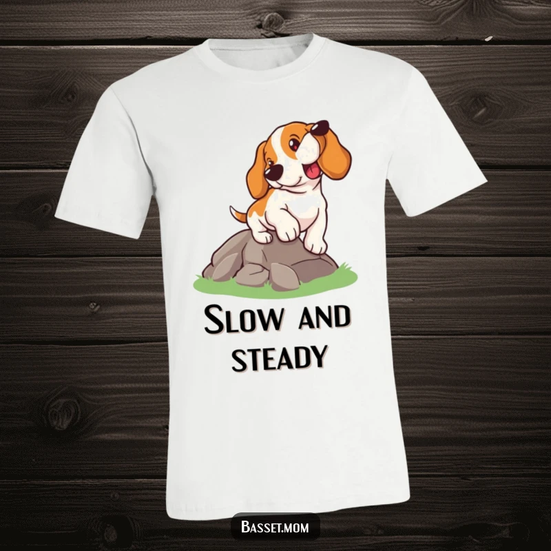 Funny Basset Hound t-shirt, a dog with a determined look climbing a small hill, representing dedication and effort, a funny gift.