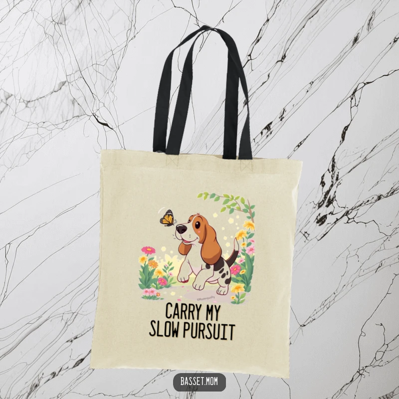 Funny Basset Hound Tote Bag: A dog joyfully chases a butterfly through a sunny garden, perfect for errands.