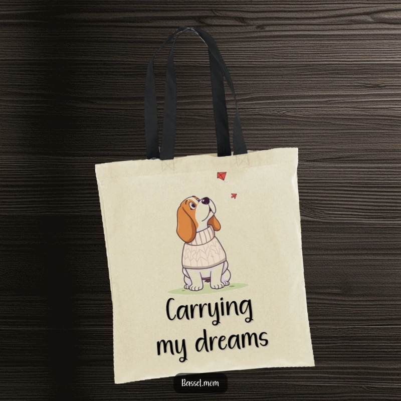 Funny Basset Hound tote bag showing a dog in a knitted sweater looking up at a kite, a humorous accessory for autumn outings.
