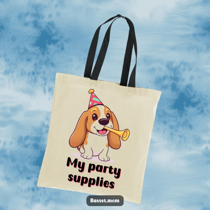 Funny Basset Hound tote bag, a dog in a party hat, blowing a small trumpet, perfect for carrying party supplies.